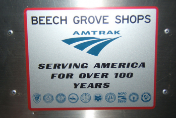 Remanufacturer's plate appearing inside an Amtrak passenger car.